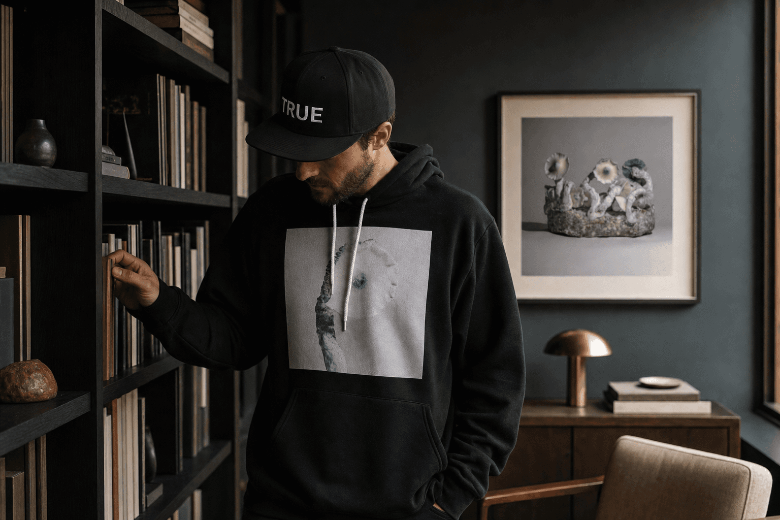 Representative reading-room campaign scene with Jack's Solitude hoodie, the TRUE snapback, and Jack Frost Circle print
