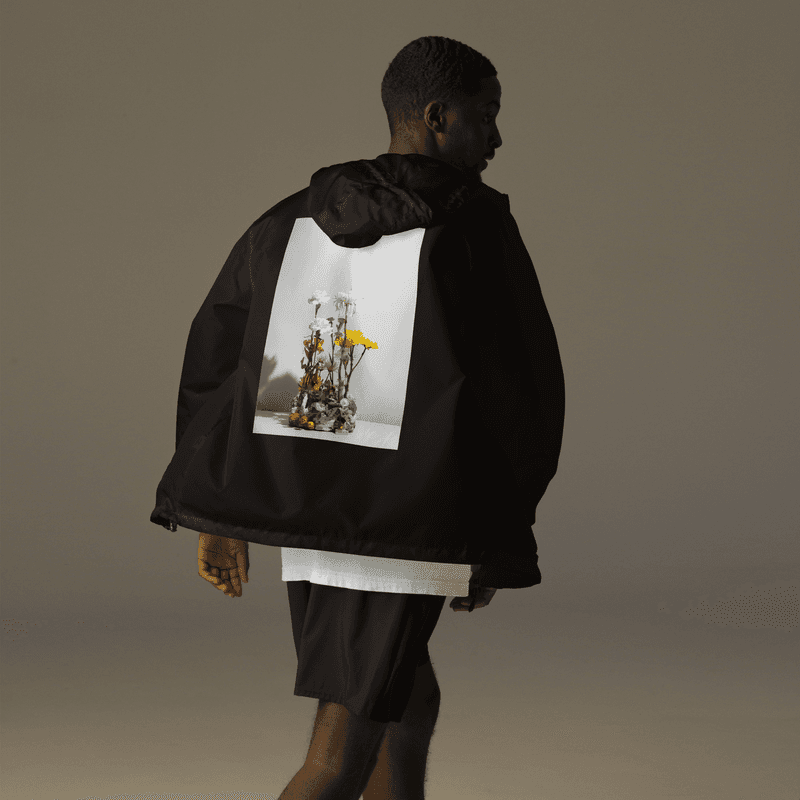 Exact black Garden Whisperer windbreaker product reference